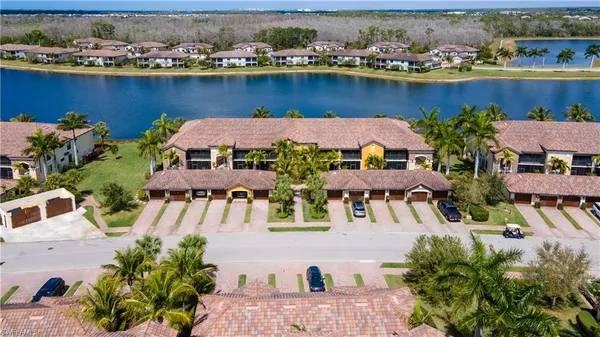 an aerial view of a house with outdoor space