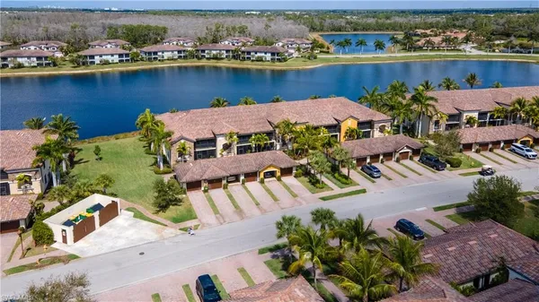 an aerial view of a house with outdoor space