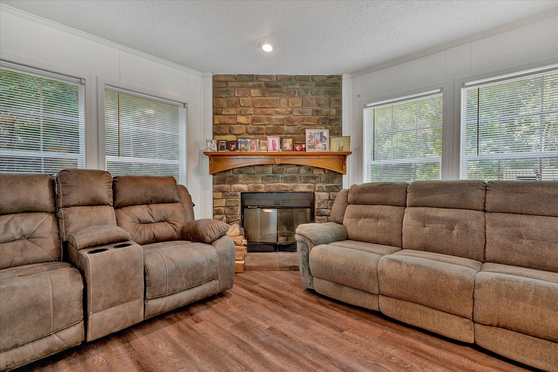108 Summitt Ridge Drive Blue Ridge, VA 24064 - Photo 17 of 30 a living room with furniture and a fireplace
