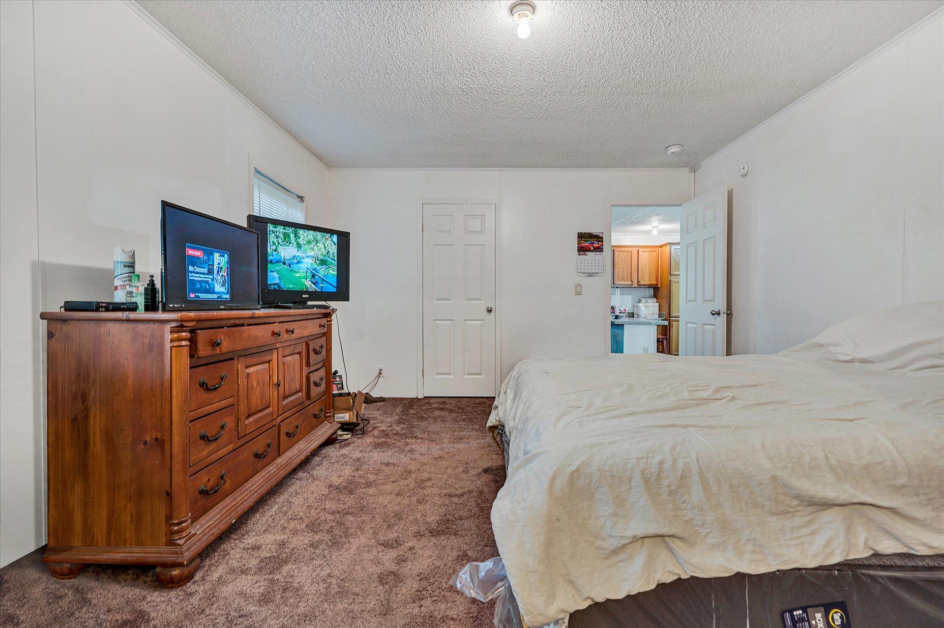 108 Summitt Ridge Drive Blue Ridge, VA 24064 - Photo 23 of 30 a bed room with a bed and a television
