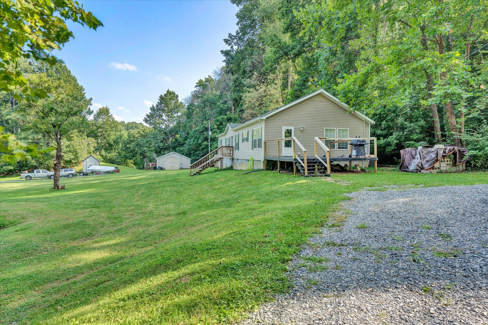 108 Summitt Ridge Drive Blue Ridge, VA 24064 - Photo 29 of 30 a view of a house with a yard