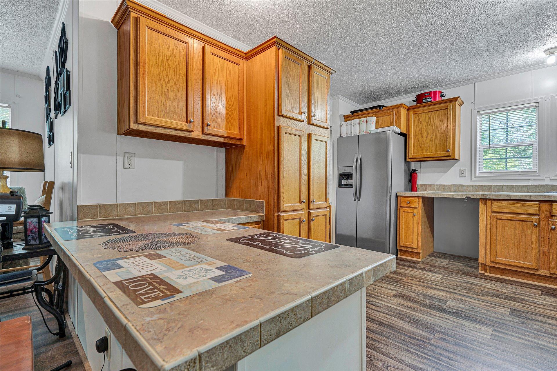 108 Summitt Ridge Drive Blue Ridge, VA 24064 - Photo 10 of 30 a kitchen that has a cabinets and a stove