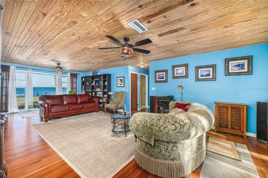 2518 Fort Lane Road Geneva, FL 32732 - Photo 12 of 44 a living room with furniture and a table