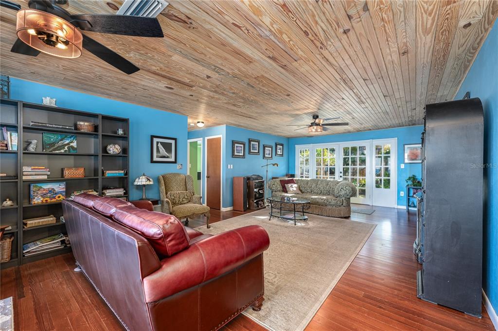 2518 Fort Lane Road Geneva, FL 32732 - Photo 13 of 44 a living room with furniture and wooden floor