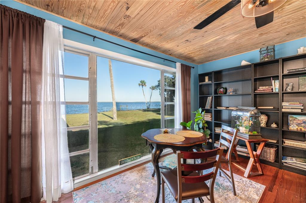2518 Fort Lane Road Geneva, FL 32732 - Photo 14 of 44 a view of a dining room with a table and chairs