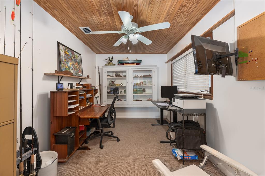 2518 Fort Lane Road Geneva, FL 32732 - Photo 19 of 44 a view of a workspace with furniture