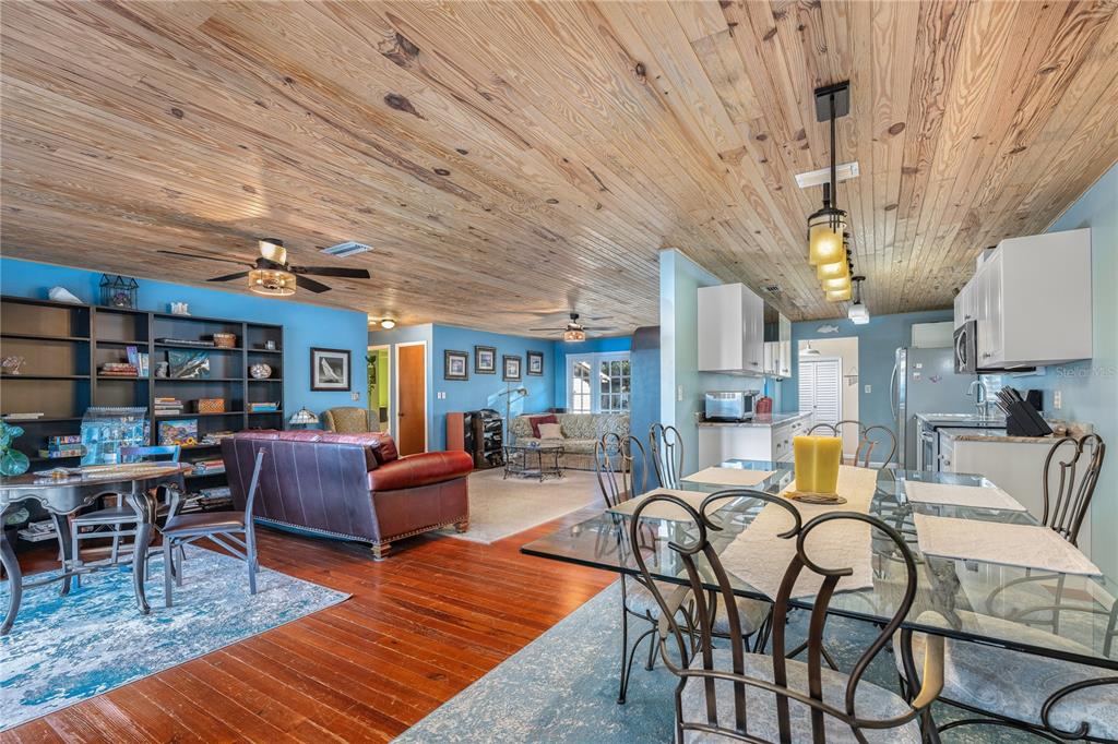 2518 Fort Lane Road Geneva, FL 32732 - Photo 21 of 44 a living room with furniture a chandelier and a table