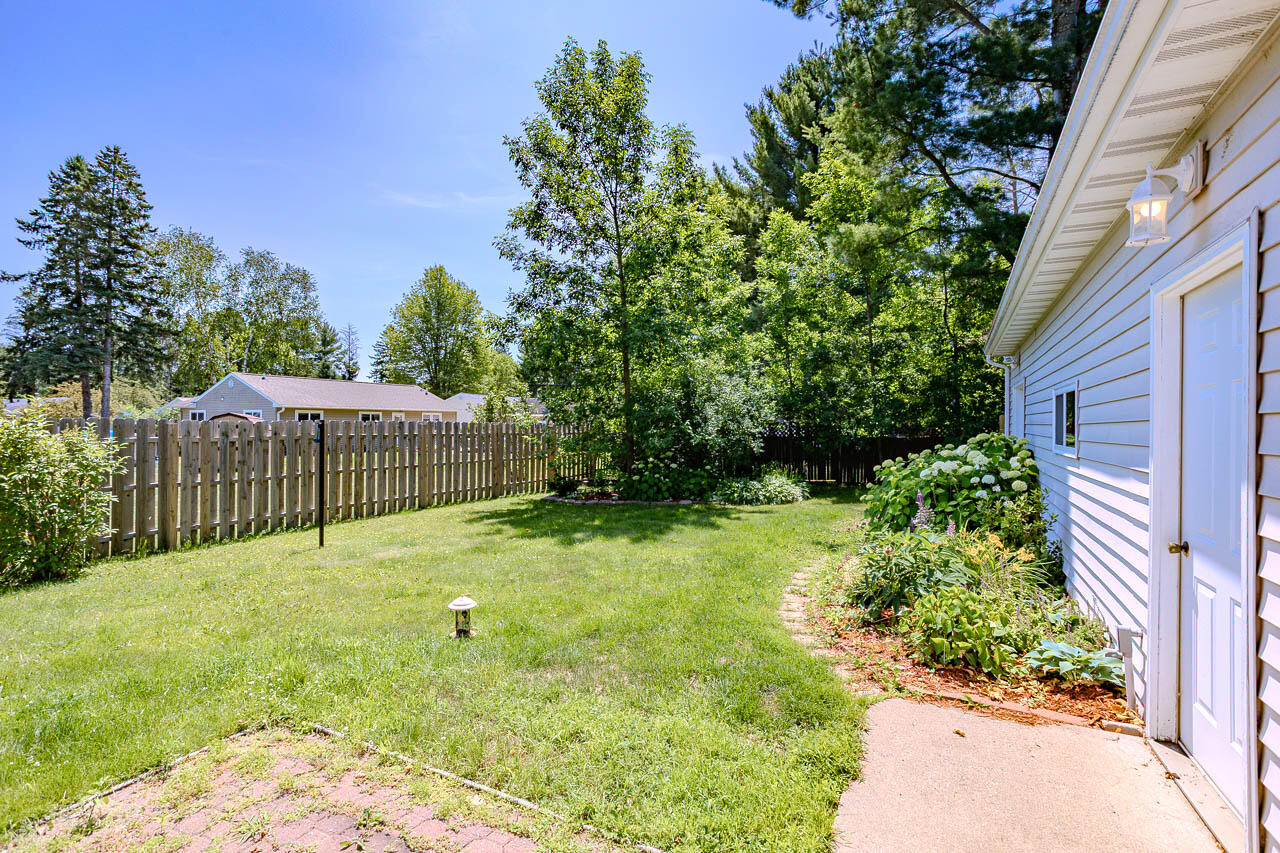 1111 Marquardt Road Wausau, WI 54403 - Photo 11 of 62 Walkway along the garage