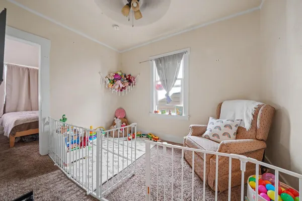 a view of a dining room with furniture