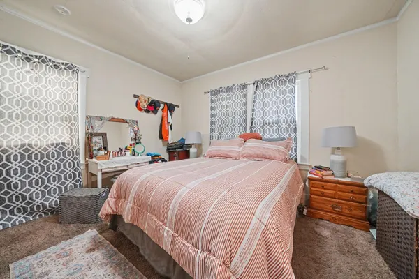 a open kitchen that has a lot of cabinets a sink and a stove in it