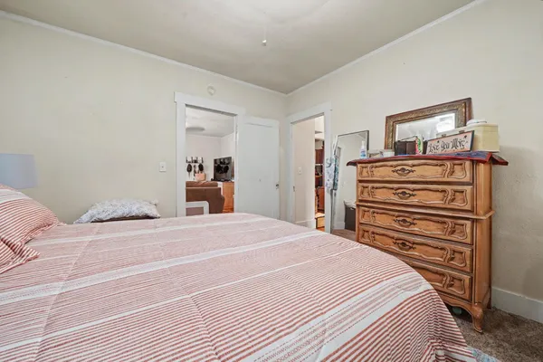 a kitchen with stainless steel appliances granite countertop a stove and a refrigerator