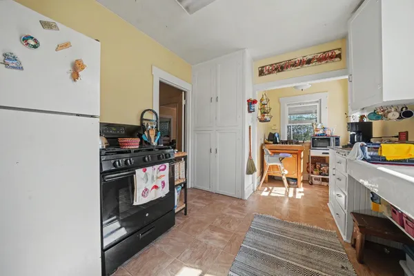 a backyard of a house with seating space