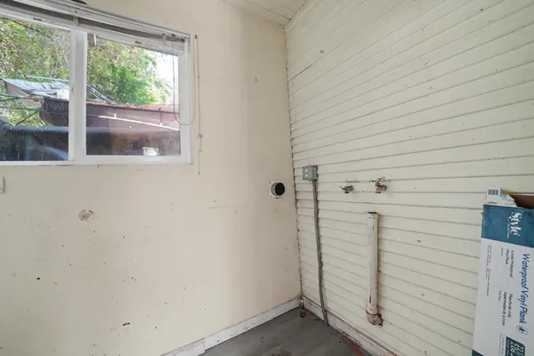 an aerial view of multiple houses with yard