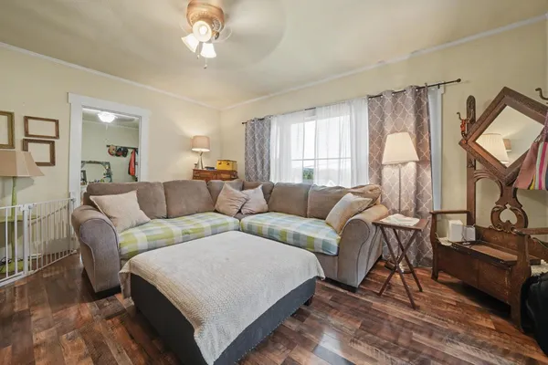 a bedroom with bed and a window