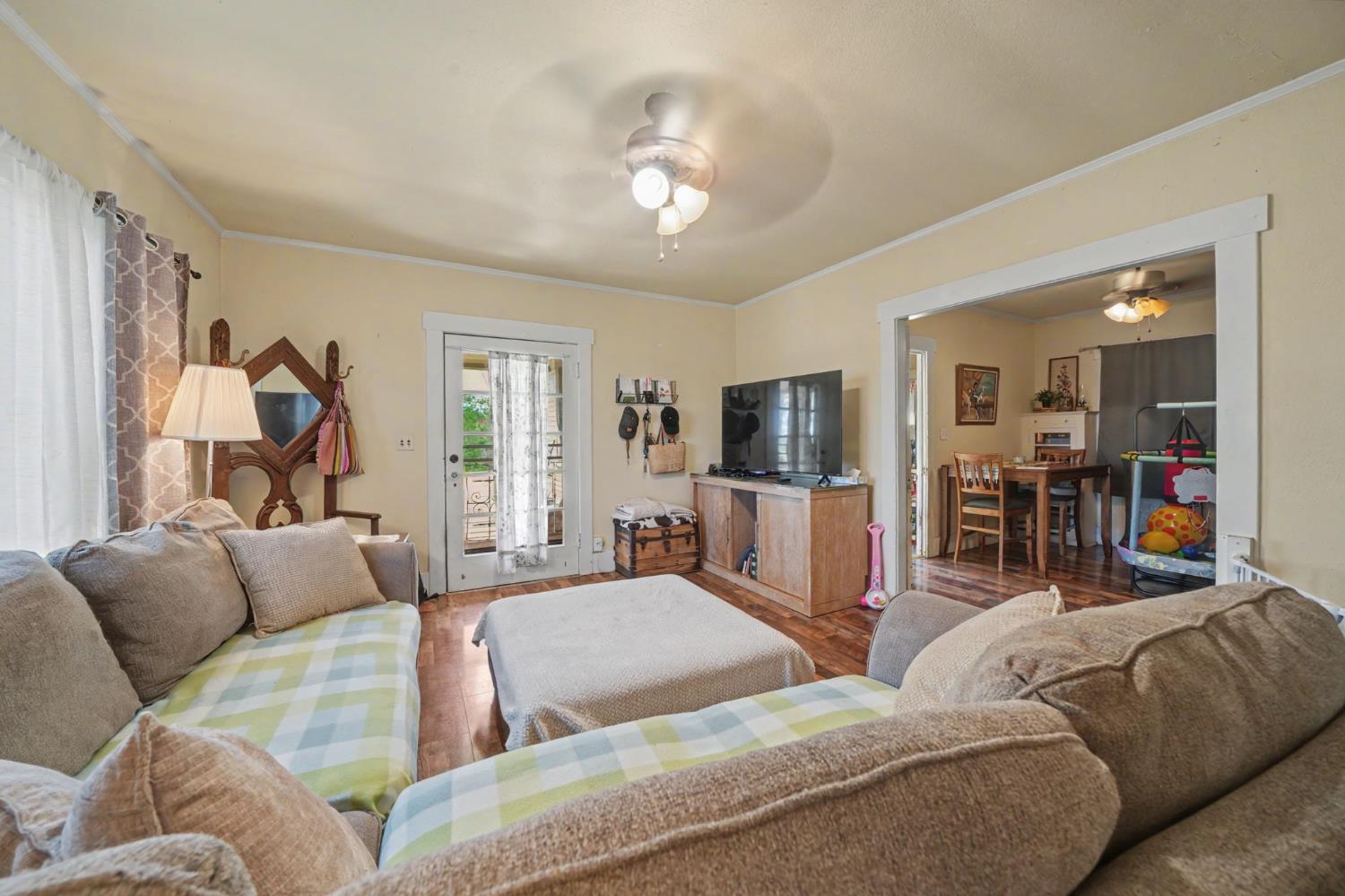 411 Rex Avenue Jackson, CA 95642 - Photo 10 of 72 a living room with furniture and a flat screen tv