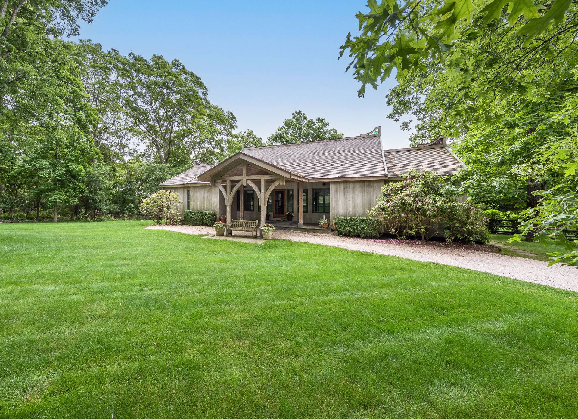22 Casey Lane Bridgehampton, NY 11932 - Photo 24 of 24 a front view of a house with a garden