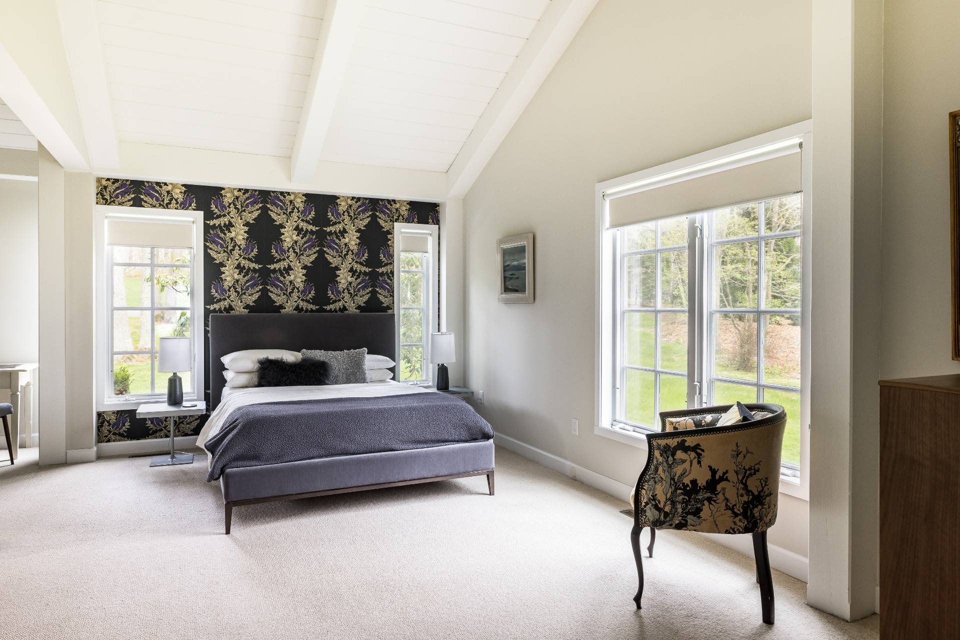 22 Casey Lane Bridgehampton, NY 11932 - Photo 6 of 24 a bedroom with a bed and large windows