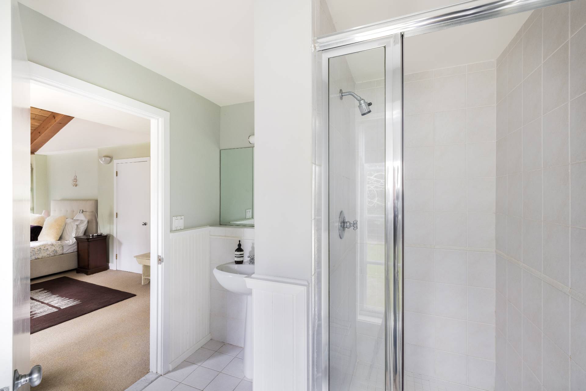 22 Casey Lane Bridgehampton, NY 11932 - Photo 9 of 24 a bathroom with a bathtub and a sink