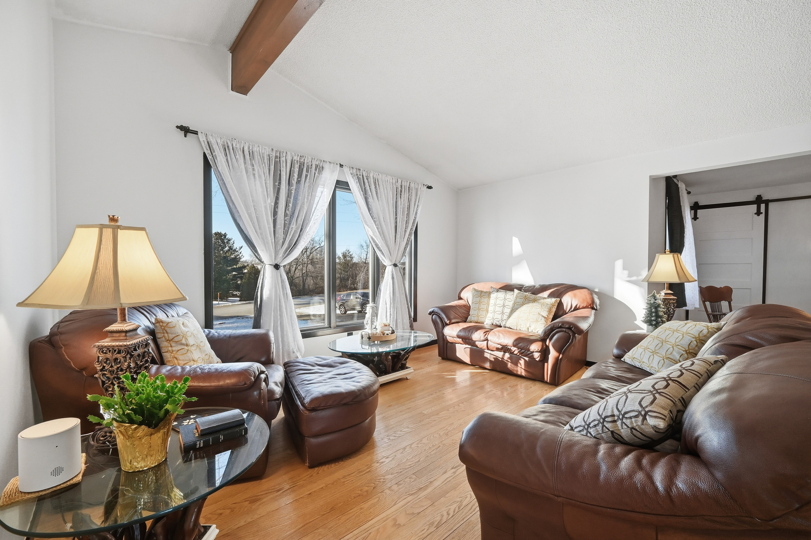 9807 North Leaf River Road Leaf River, IL 61047 - Photo 5 of 38 a living room with furniture and a large window