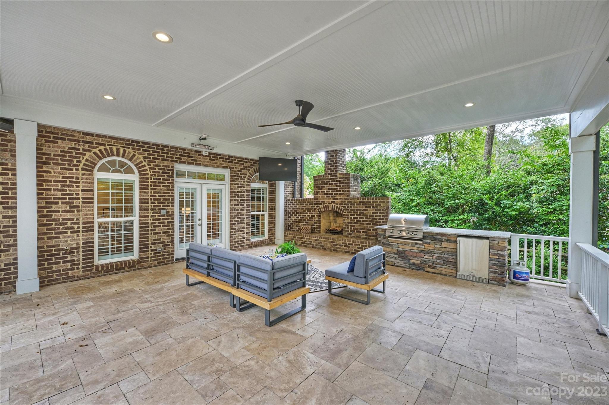 3118 Sharon View Road Charlotte, NC 28210 - Photo 14 of 48 a backyard of a house with outdoor seating
