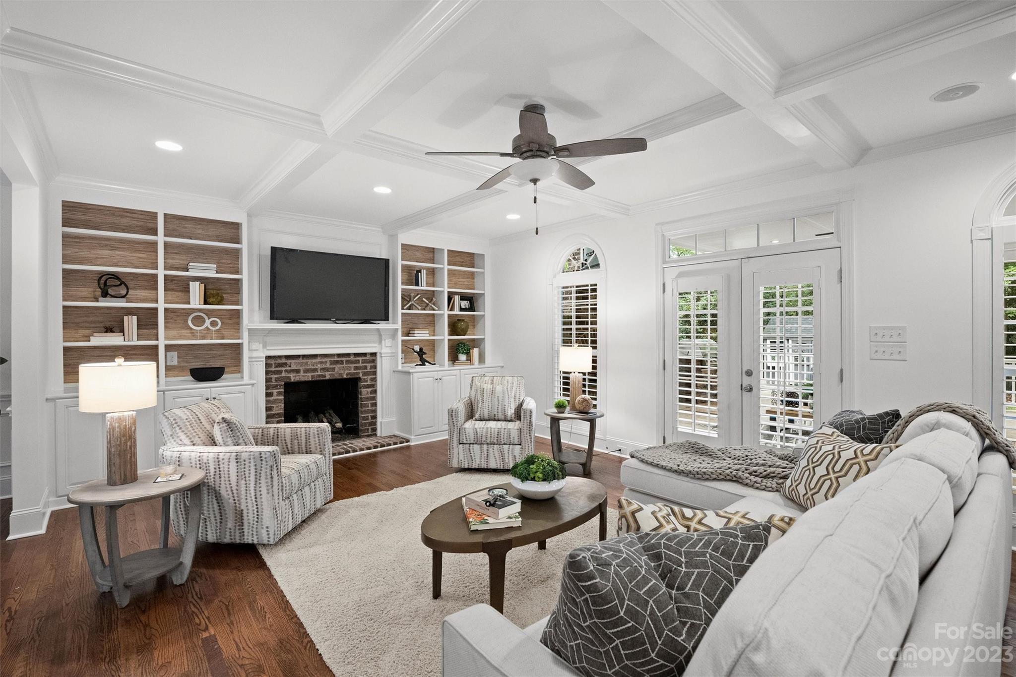 3118 Sharon View Road Charlotte, NC 28210 - Photo 21 of 48 a living room with furniture a fireplace and a flat screen tv