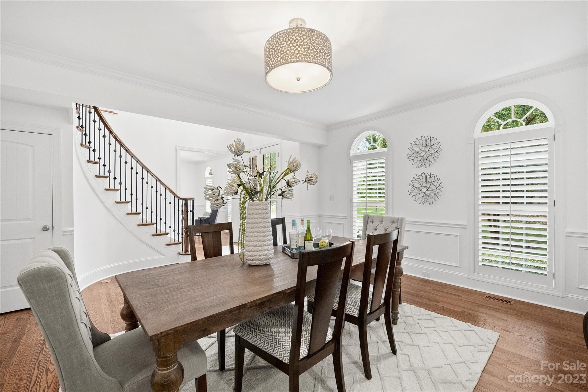 3118 Sharon View Road Charlotte, NC 28210 - Photo 24 of 48 a view of a dining room with furniture and wooden floor
