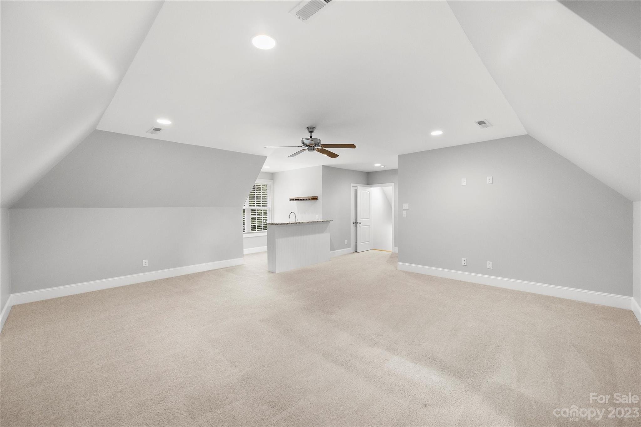3118 Sharon View Road Charlotte, NC 28210 - Photo 28 of 48 an empty room with a kitchen and a sink