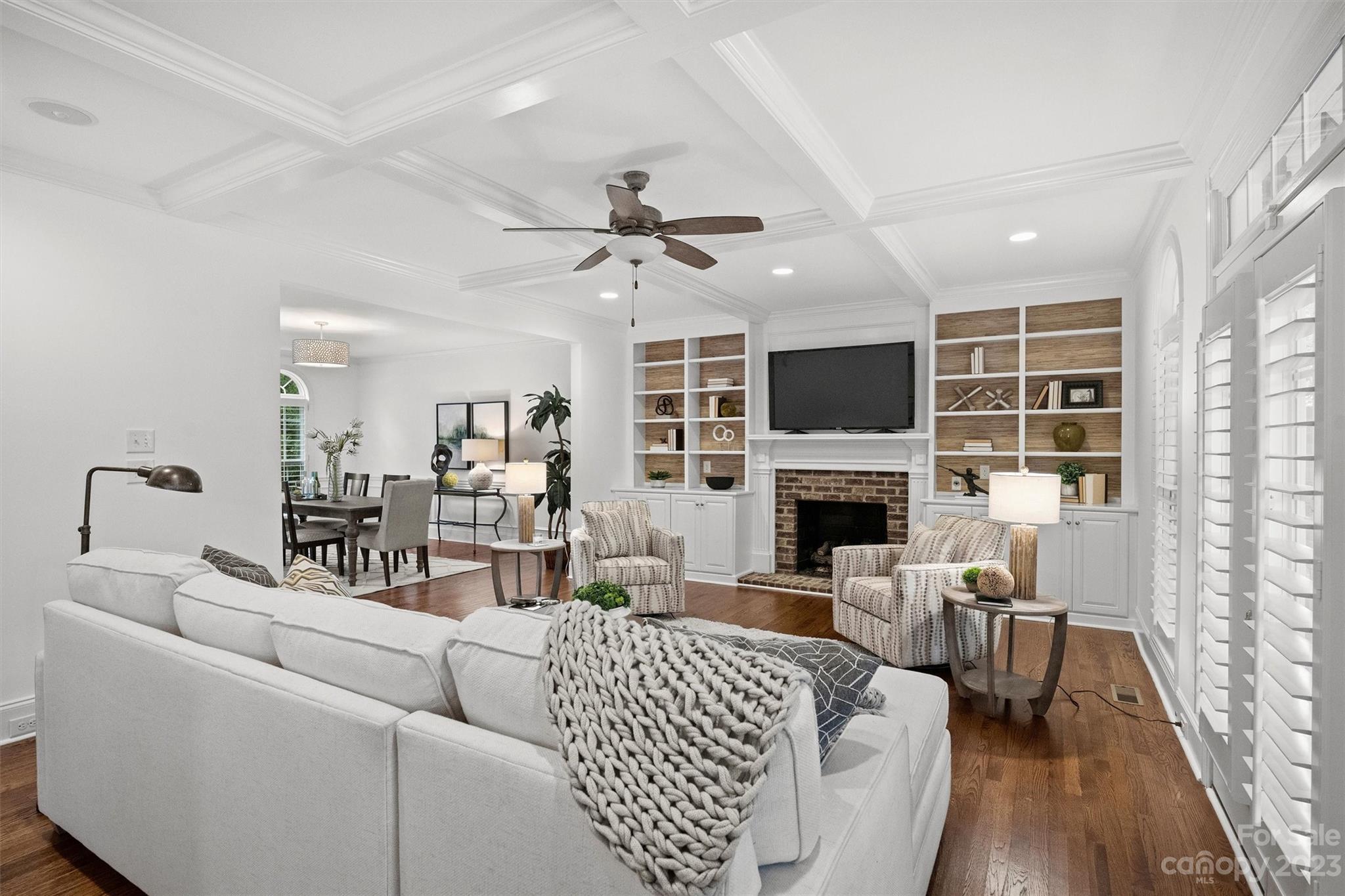 3118 Sharon View Road Charlotte, NC 28210 - Photo 31 of 48 a living room with furniture a fireplace and a flat screen tv