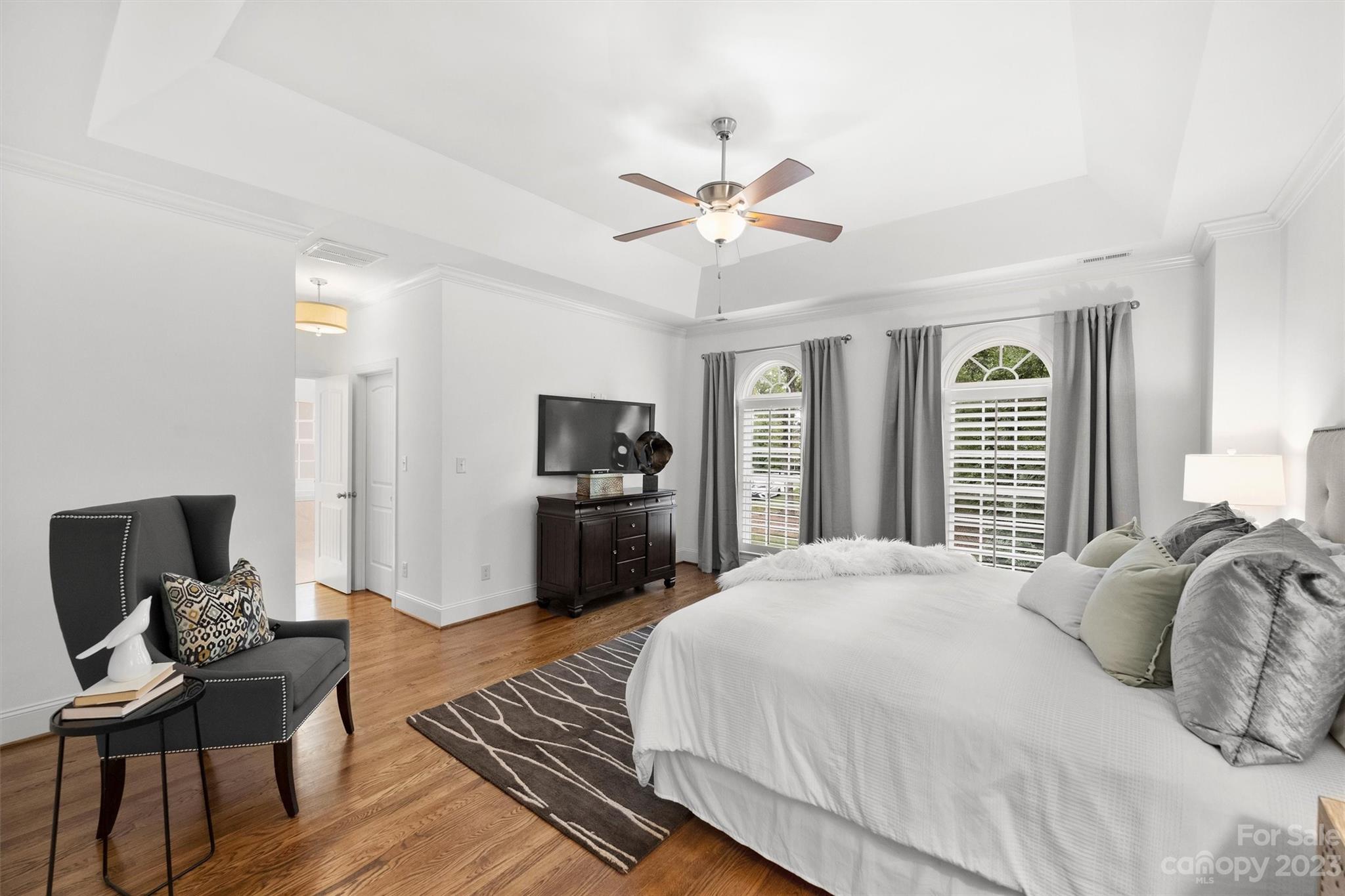 3118 Sharon View Road Charlotte, NC 28210 - Photo 32 of 48 a bedroom with a bed and a tv