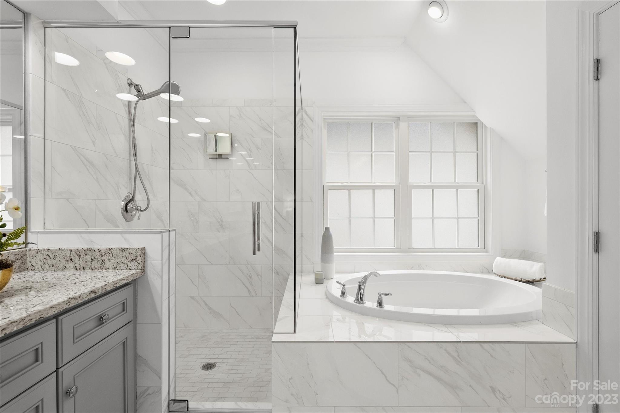 3118 Sharon View Road Charlotte, NC 28210 - Photo 33 of 48 a bathroom with a granite countertop bathtub shower sink and mirror