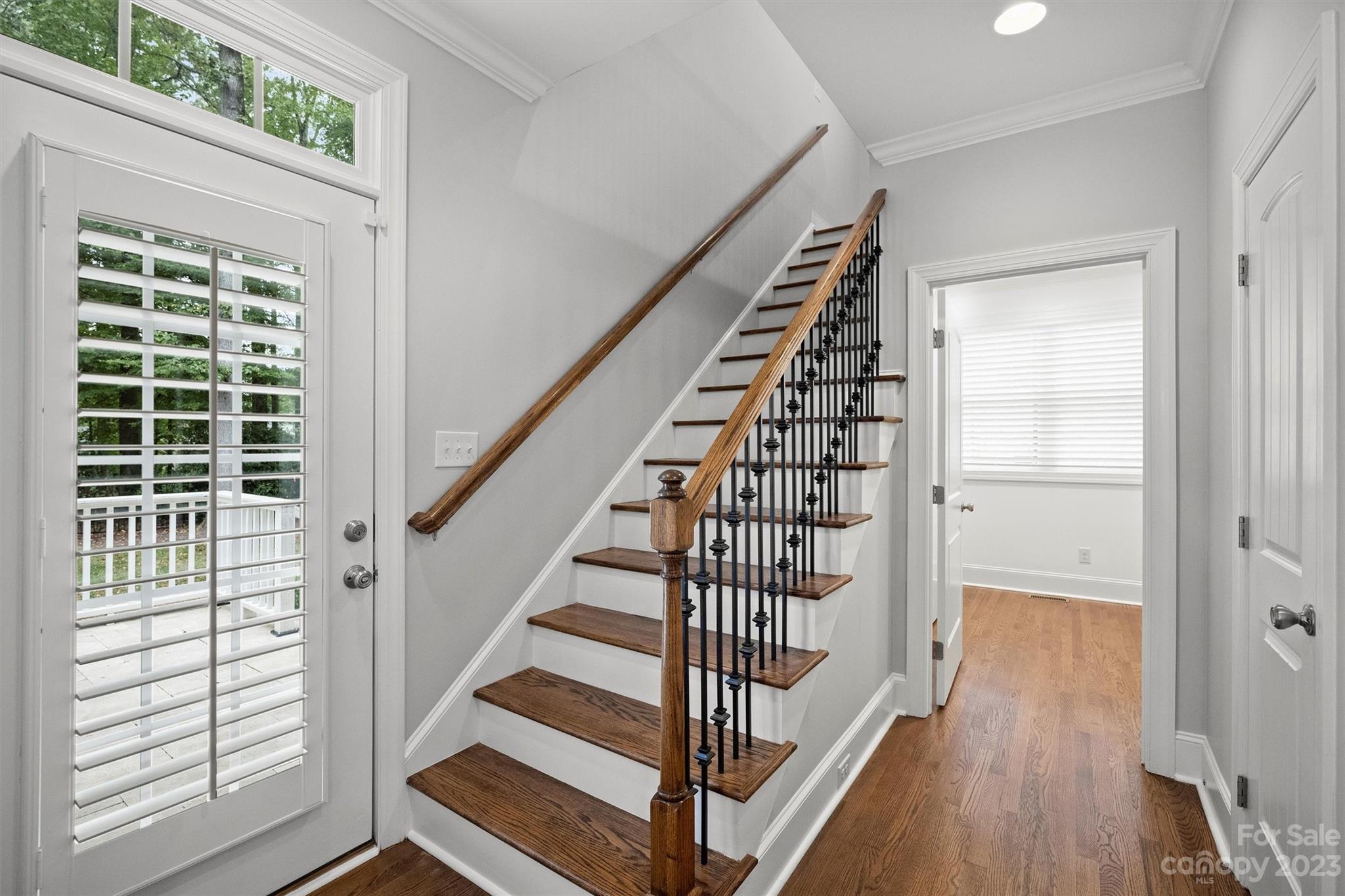 3118 Sharon View Road Charlotte, NC 28210 - Photo 40 of 48 a view of entryway with wooden floor and stairs