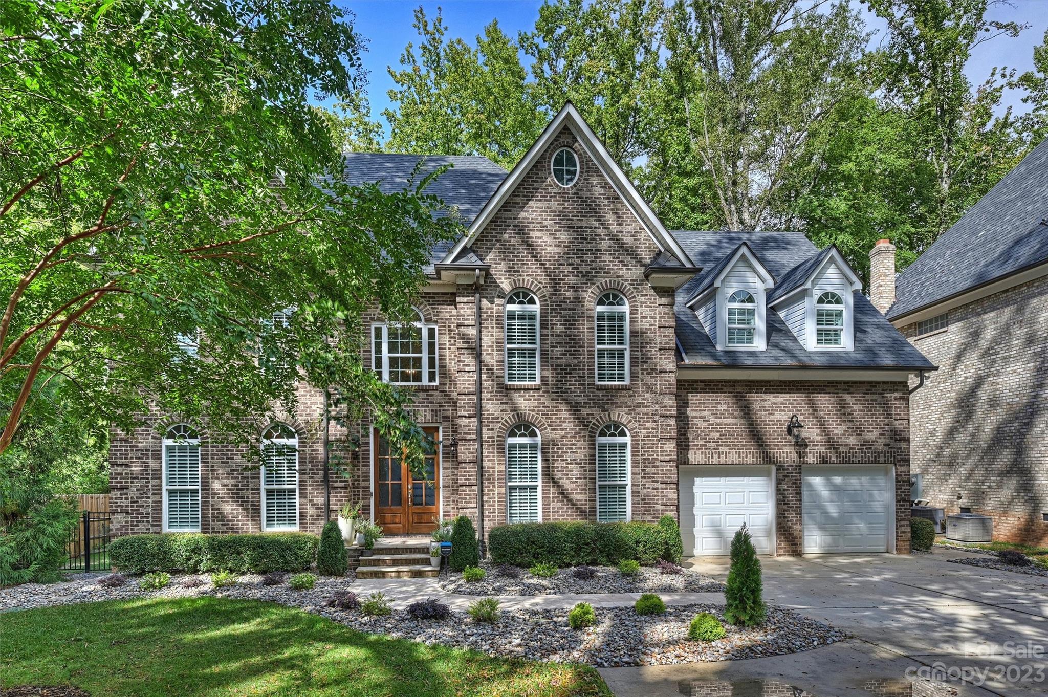 3118 Sharon View Road Charlotte, NC 28210 - Photo 43 of 48 a front view of a house with garden