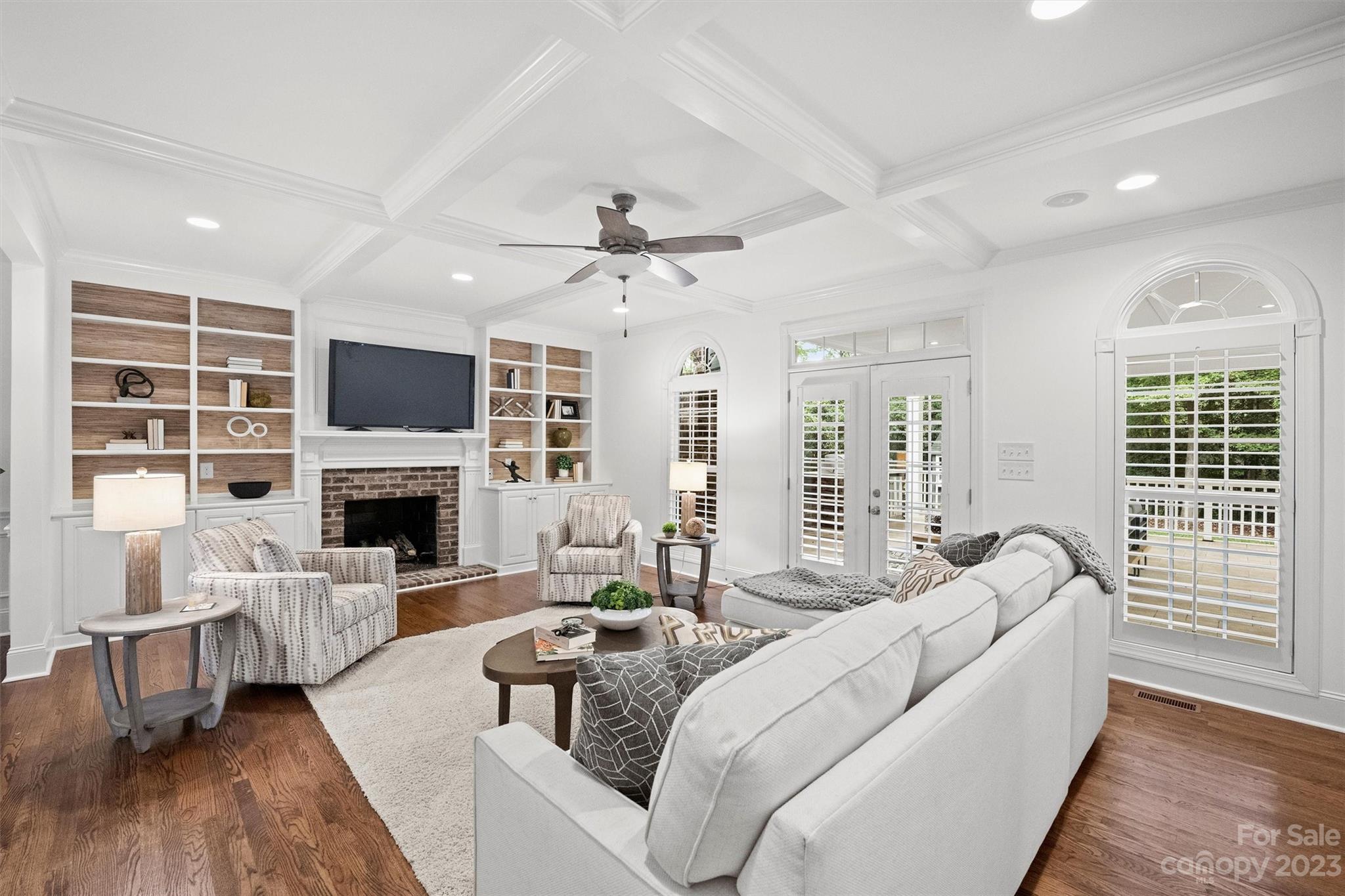 3118 Sharon View Road Charlotte, NC 28210 - Photo 6 of 48 a living room with furniture fireplace and a flat screen tv
