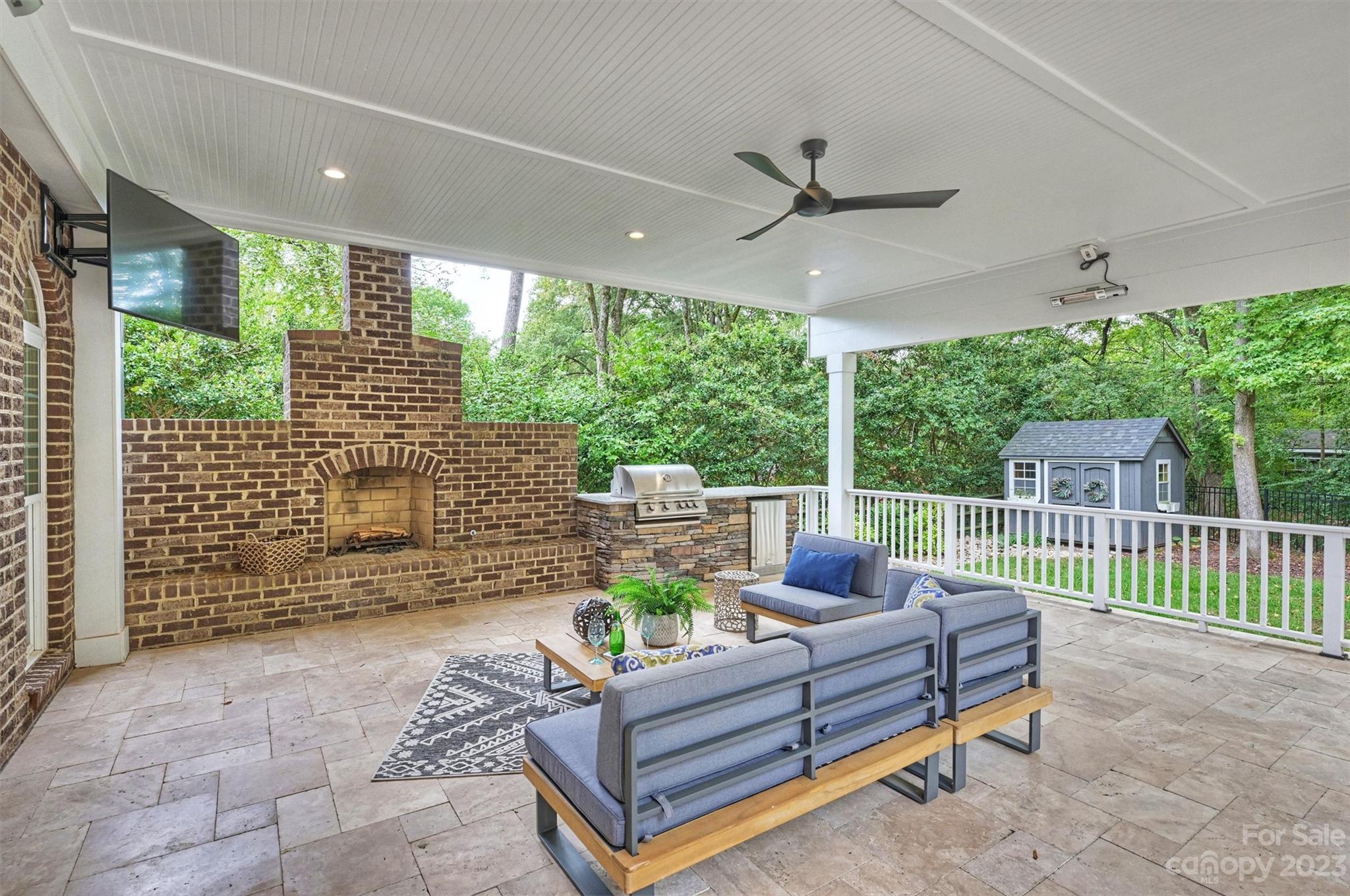 3118 Sharon View Road Charlotte, NC 28210 - Photo 7 of 48 a outdoor living space with furniture and garden view