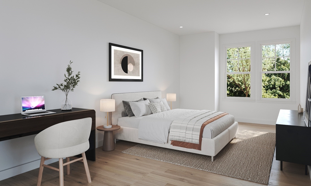 176 School Street, Unit 1 Boston, MA 02130 - Photo 5 of 5 a bedroom with a bed and a dresser