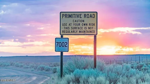 a sign on the side of the road