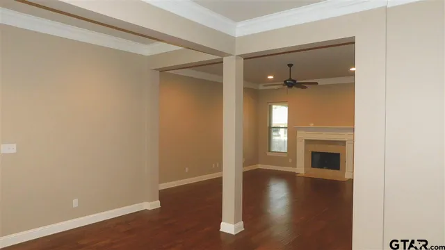 a view of a livingroom with wooden floor