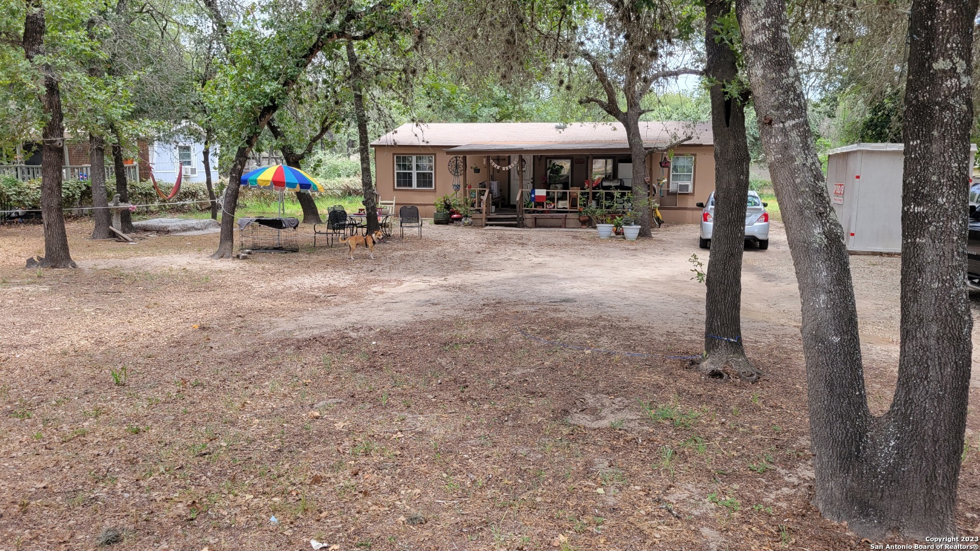 a view of a park with swings and slides