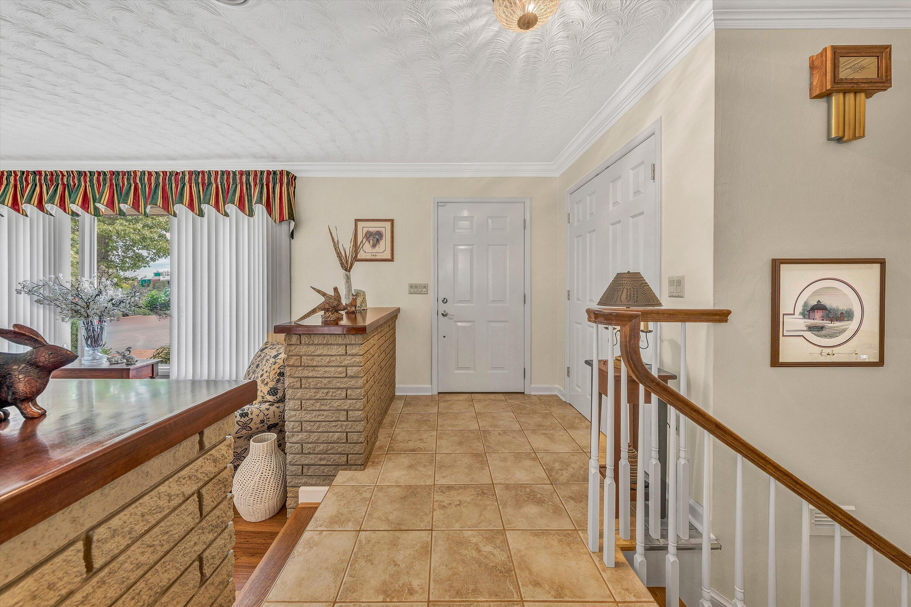 3229 Morgans Mill Road Goodview, VA 24095 - Photo 4 of 60 a view of entryway with workspace and window