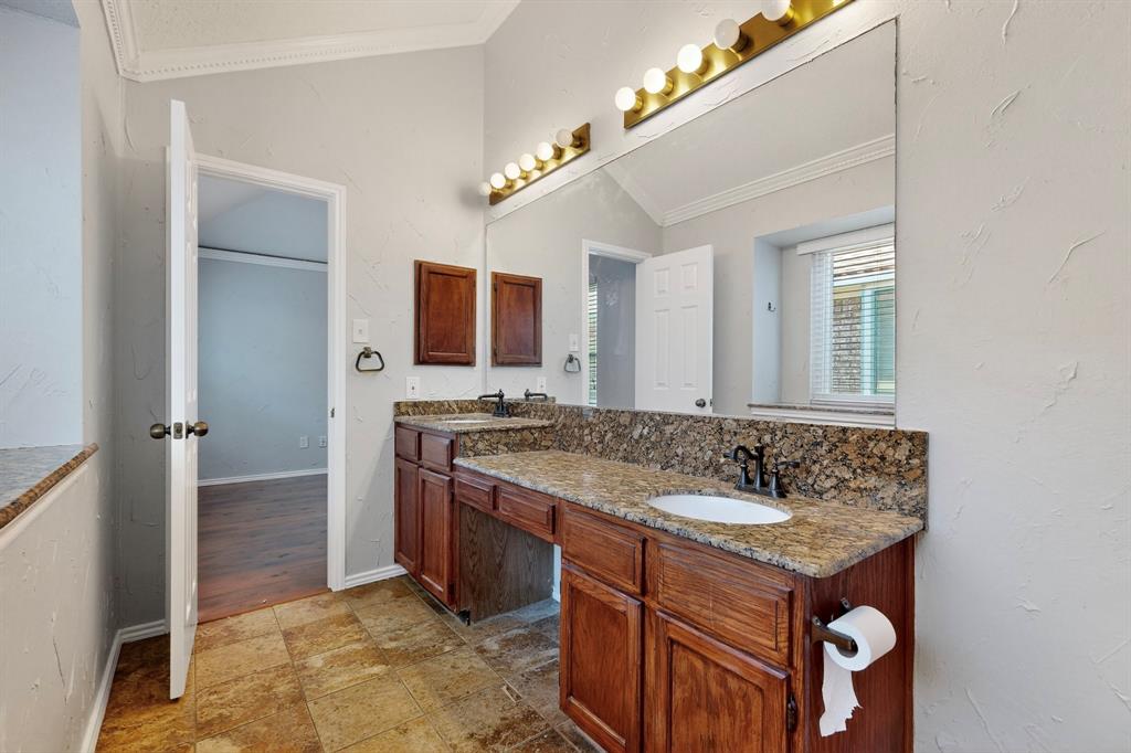 664 Phillips Drive Coppell, TX 75019 - Photo 17 of 23 primary bathroom with two sinks