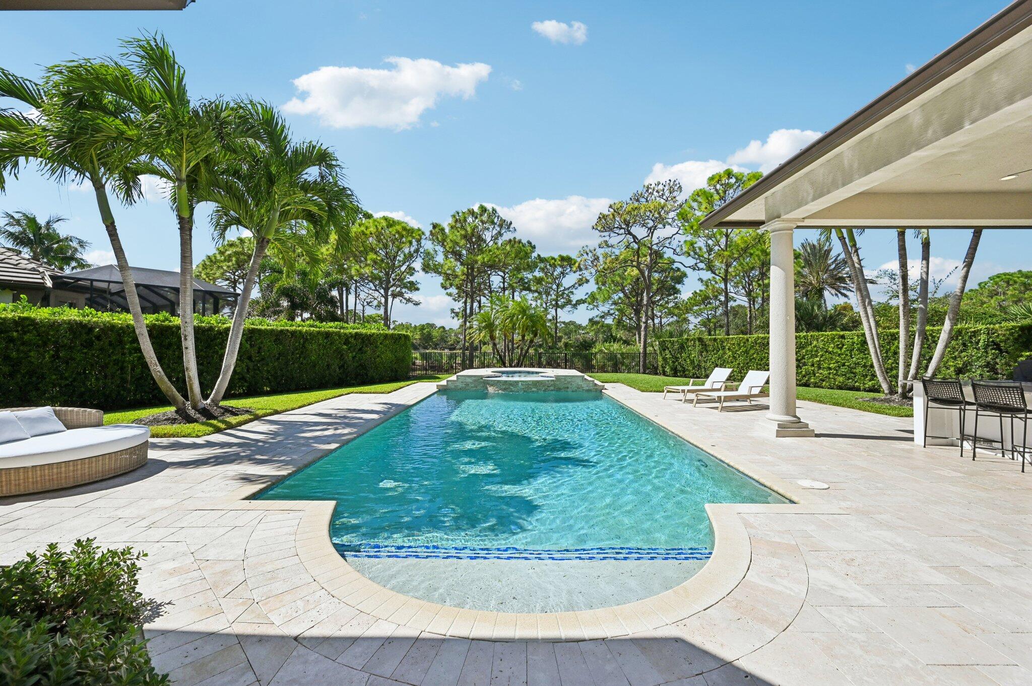 9936 Southeast Sandpine Lane Hobe Sound, FL 33455 - Photo 43 of 71 a view of a backyard