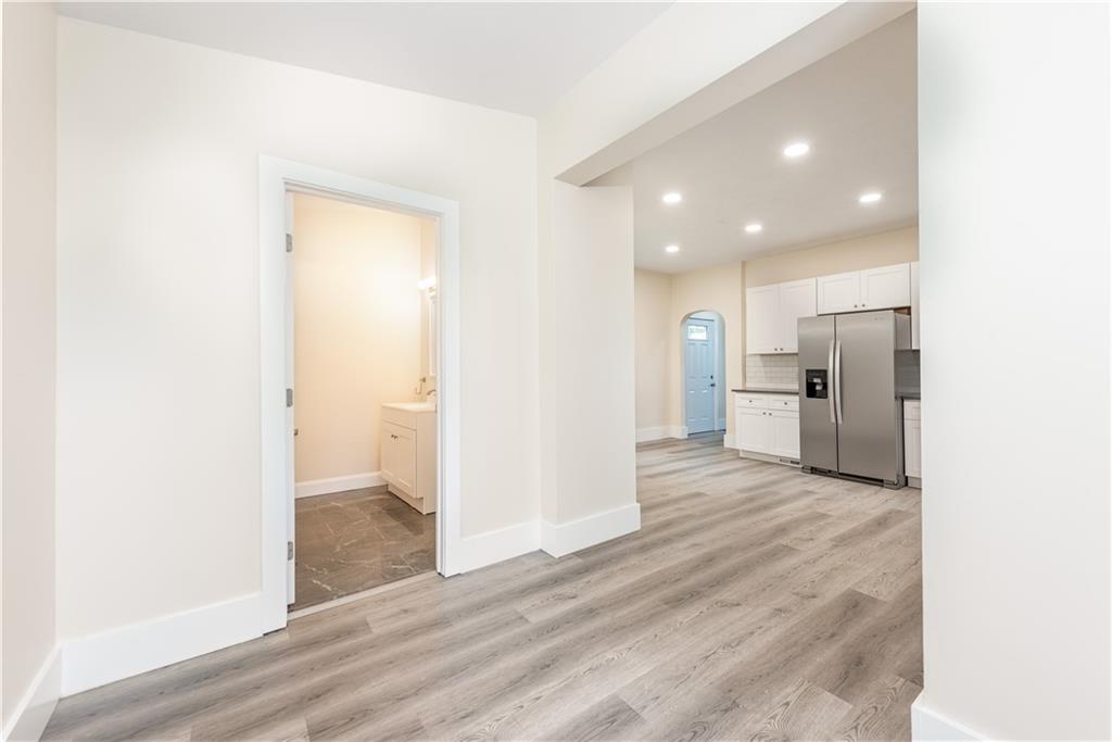 701 Main Street Irwin, PA 15642 - Photo 11 of 37 a view of a kitchen with a refrigerator and a sink
