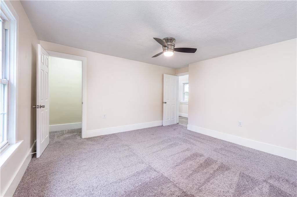 701 Main Street Irwin, PA 15642 - Photo 15 of 37 a view of an empty room with a window