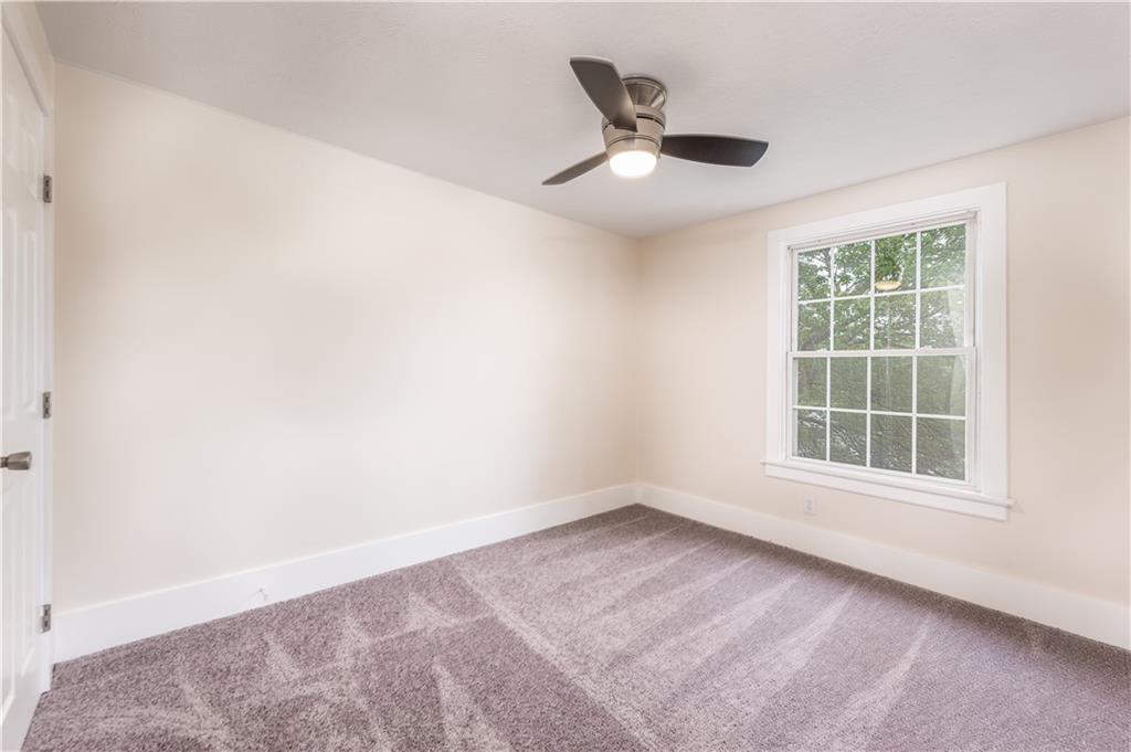 701 Main Street Irwin, PA 15642 - Photo 16 of 37 an empty room with a window