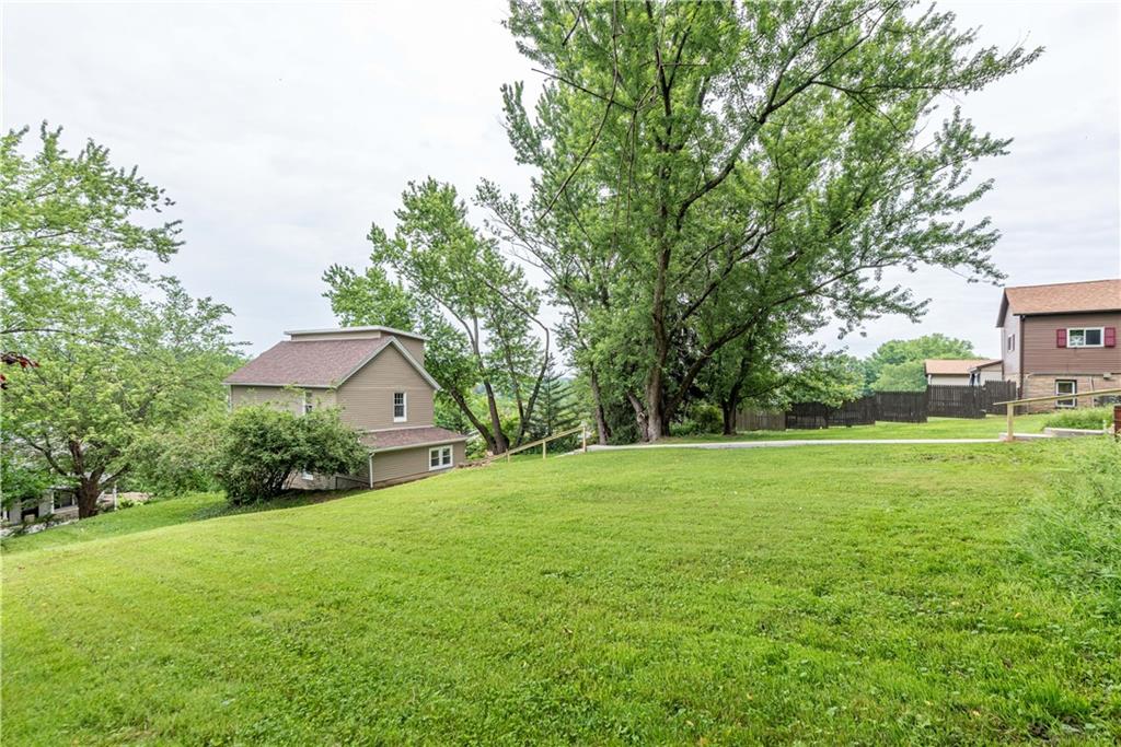701 Main Street Irwin, PA 15642 - Photo 27 of 37 a view of a backyard with large trees