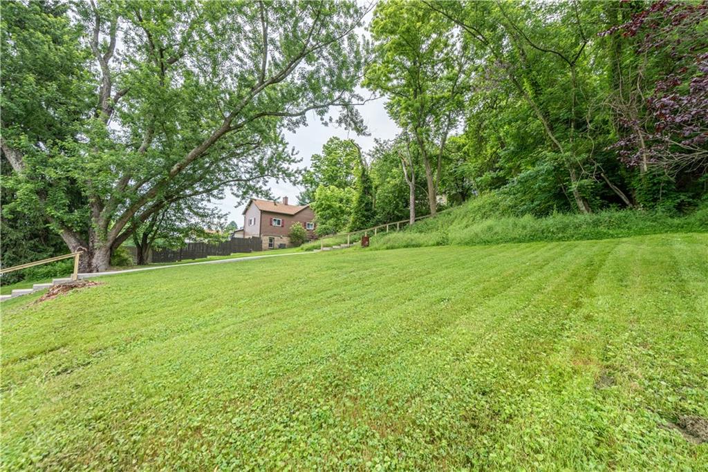 701 Main Street Irwin, PA 15642 - Photo 29 of 37 a view of a field with a tree