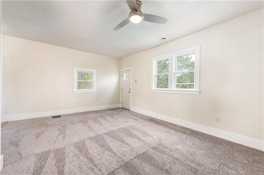 701 Main Street Irwin, PA 15642 - Photo 4 of 37 a view of an empty room with a window
