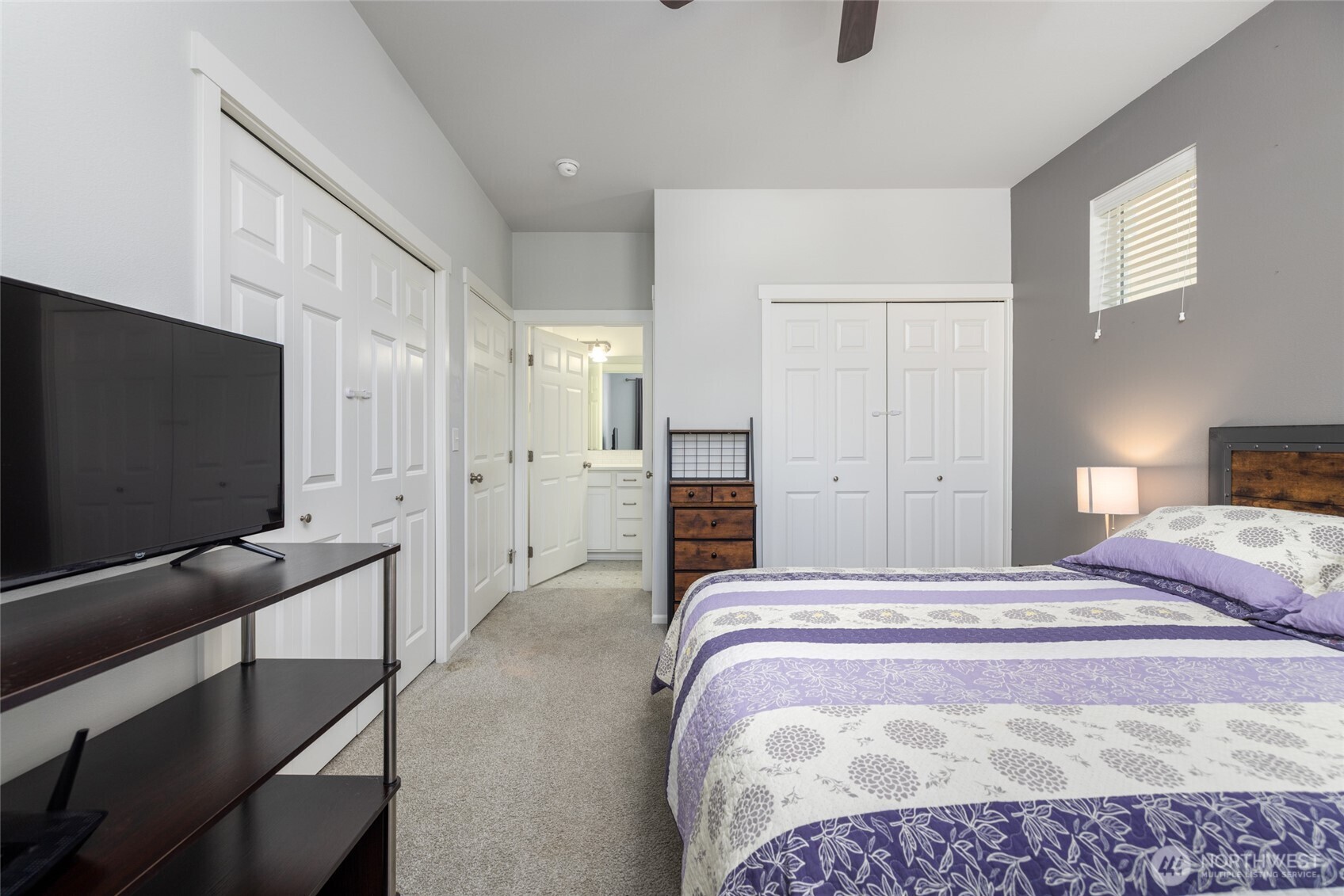 232 Sinclair Alley Mount Vernon, WA 98274 - Photo 14 of 33 a bedroom with a bed and a flat screen tv