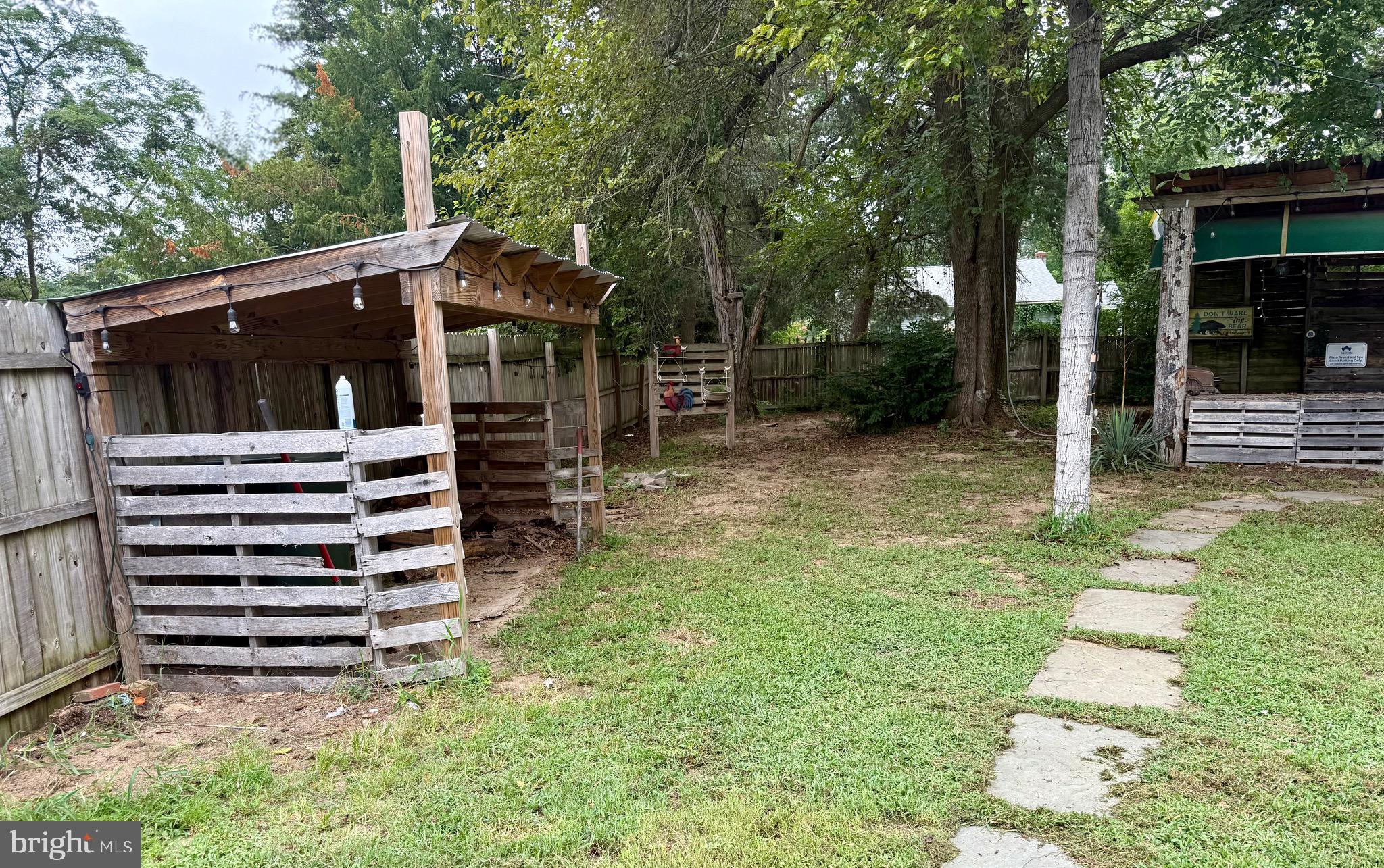 218 3rd Street Crumpton, MD 21628 - Photo 4 of 12 a front view of a house with a yard