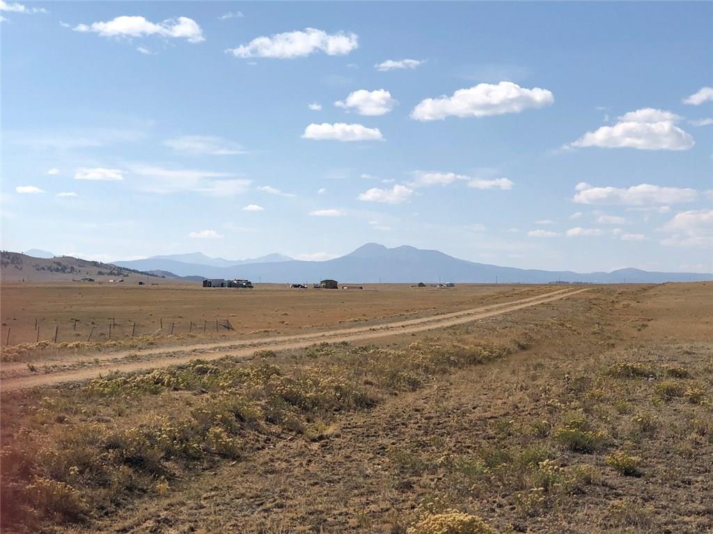 4189 Moffat Road Hartsel, CO 80449 - Photo 3 of 16 a view of an lake and mountain